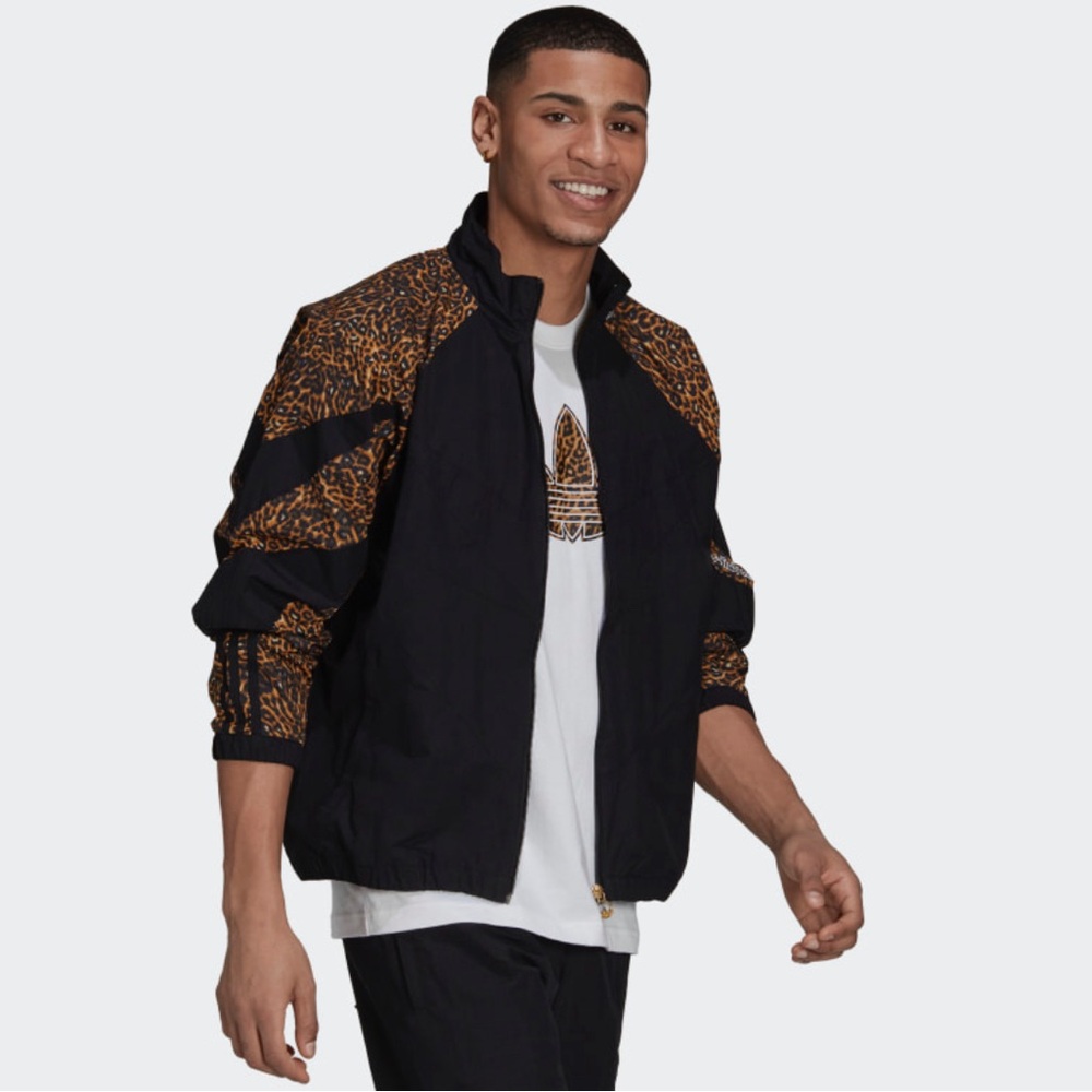 ADIDAS SPRT ANIMAL PRINT SHARK WOVEN
TRACK JACKET